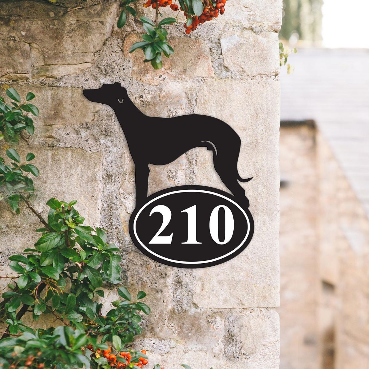 Bespoke Whippet Iron House Number Sign on a Garden Wall