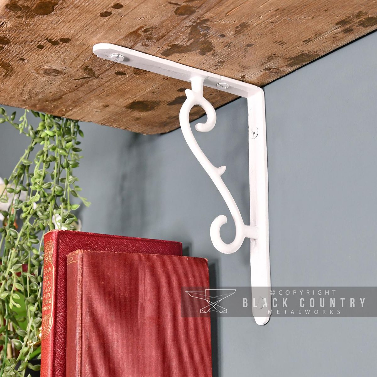 Scroll Design Shelf Bracket Finished in White Scroll Design Shelf Bracket Finished in White