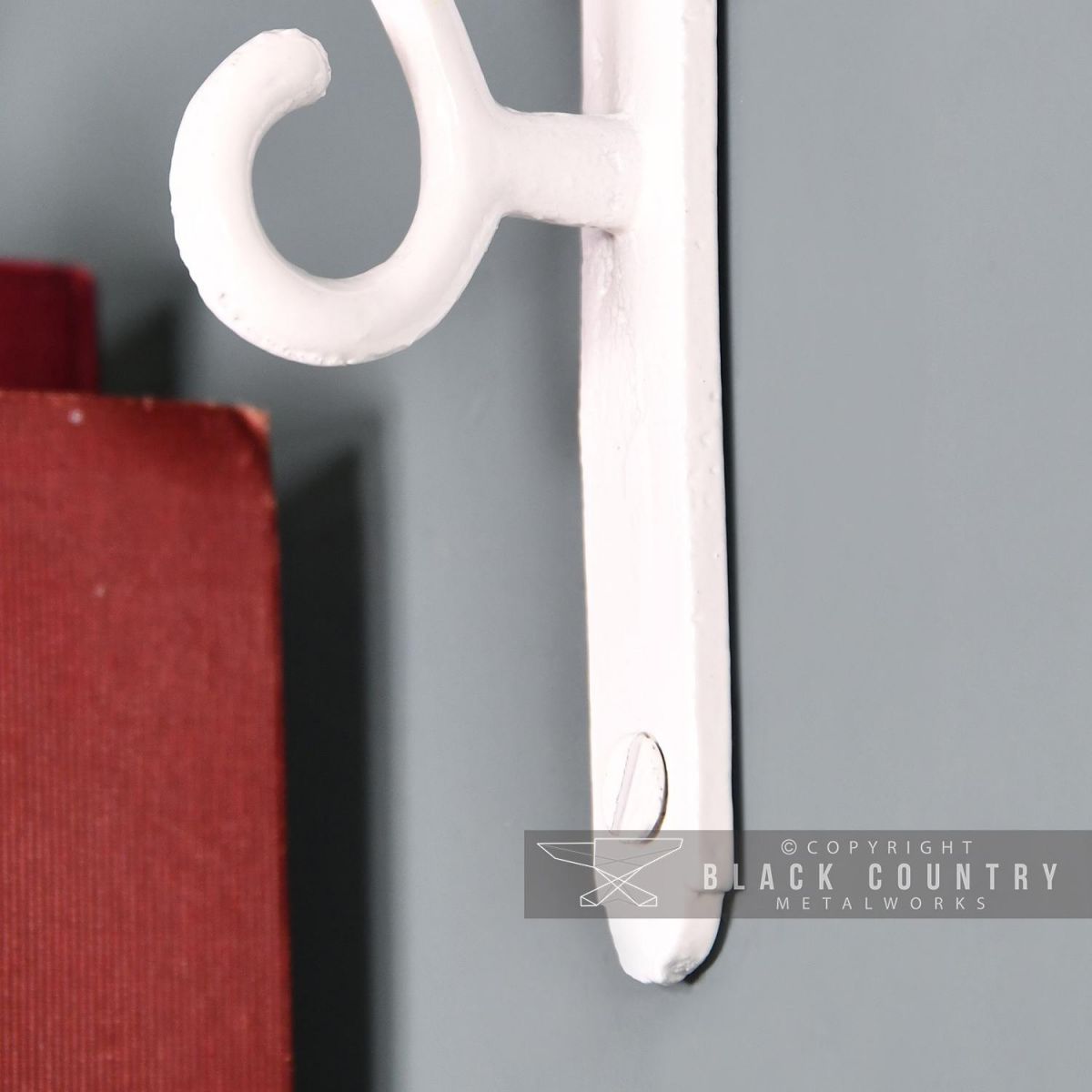 Close-up of the Bottom of the White Shelf Bracket Close-up of the Bottom of the White Shelf Bracket