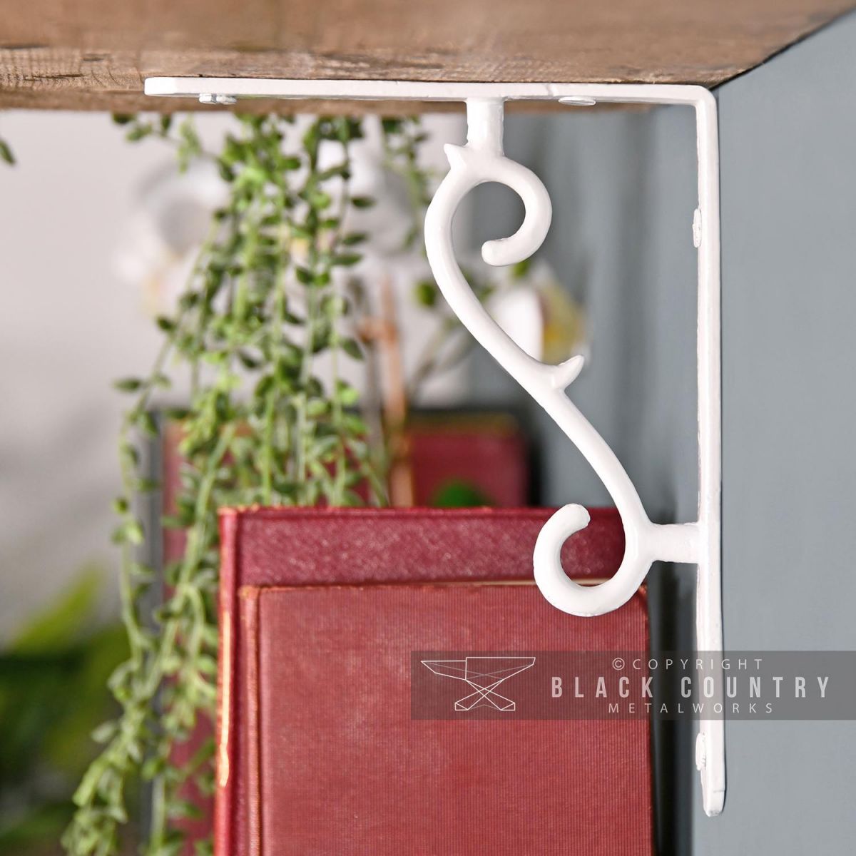 Side View of the White Scroll Design Shelf Bracket Side View of the White Scroll Design Shelf Bracket