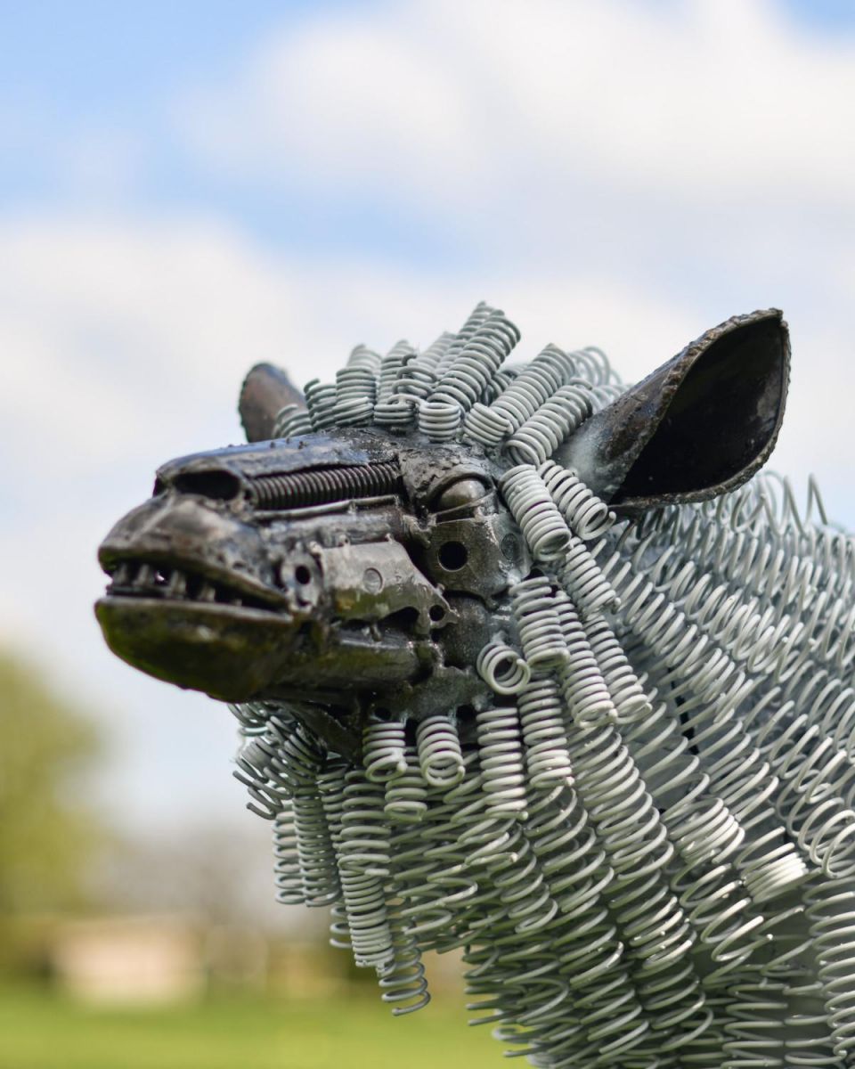 Close-Up of White Twisted Metal Garden Sculpture - Recycled Outdoor Ornament