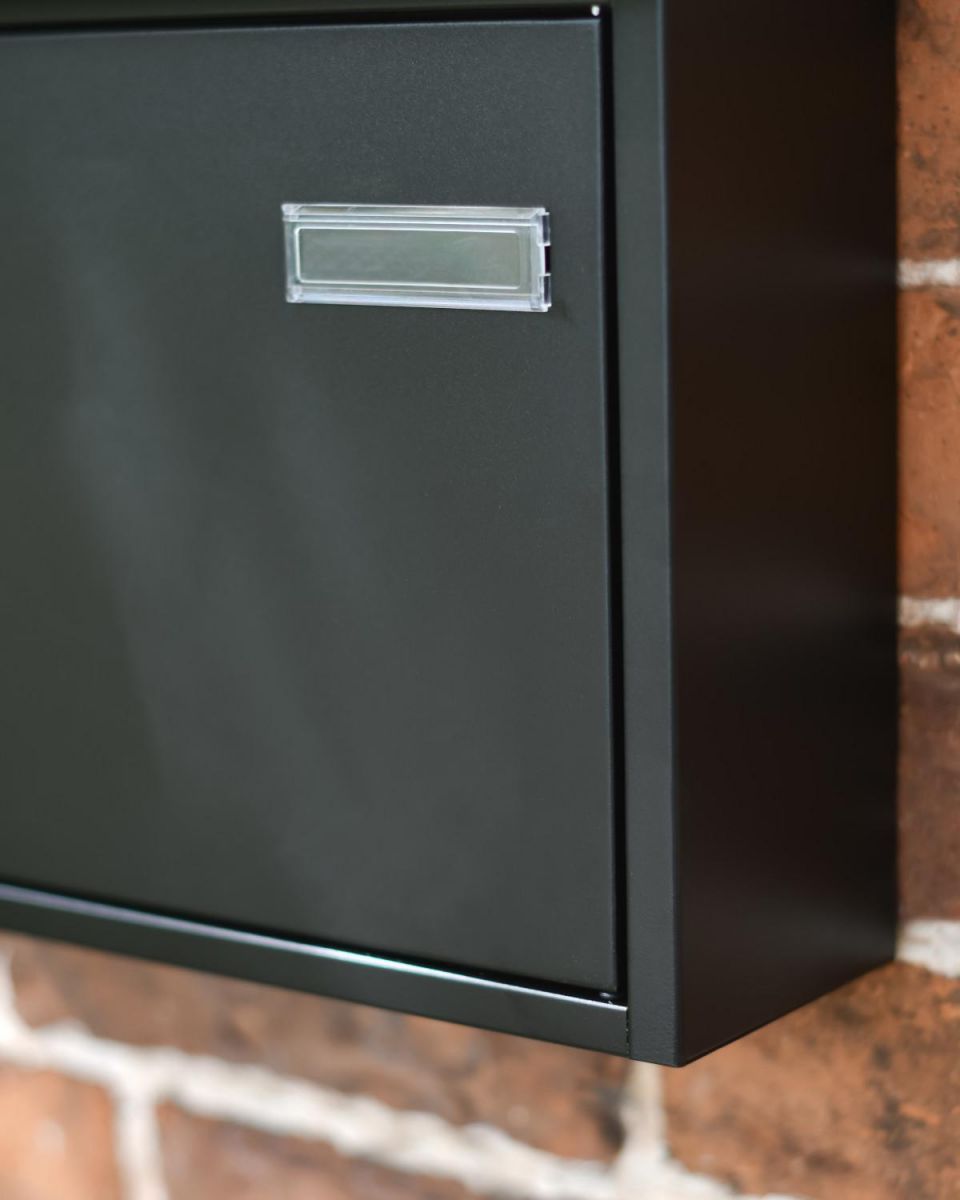 Close-Up of Reflector Plate on Wide Steel Black Wall Mounted Post Box with Lock & Reflector Plate
