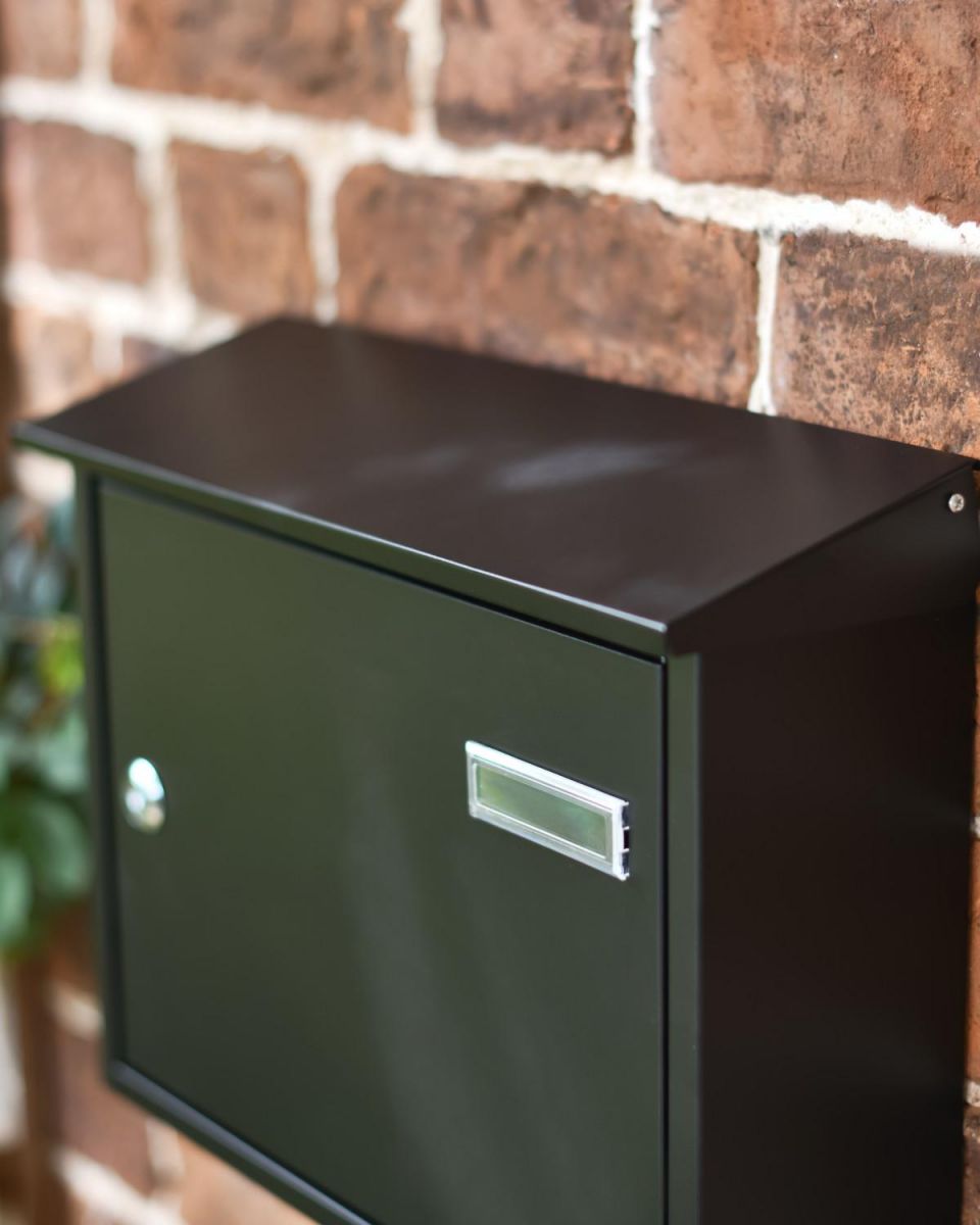 Close-Up of Angled Roof on Wide Steel Black Wall Mounted Post Box with Lock & Reflector Plate