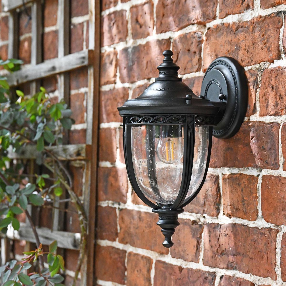 "Winsford" Traditional Top Fix Black Wall Lantern in Situ on the Front of the House