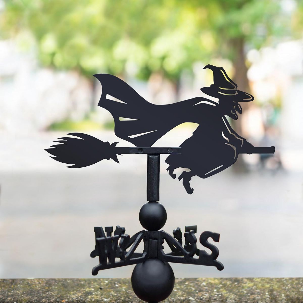 Witch Riding Broom Weathervane in Situ in the Garden