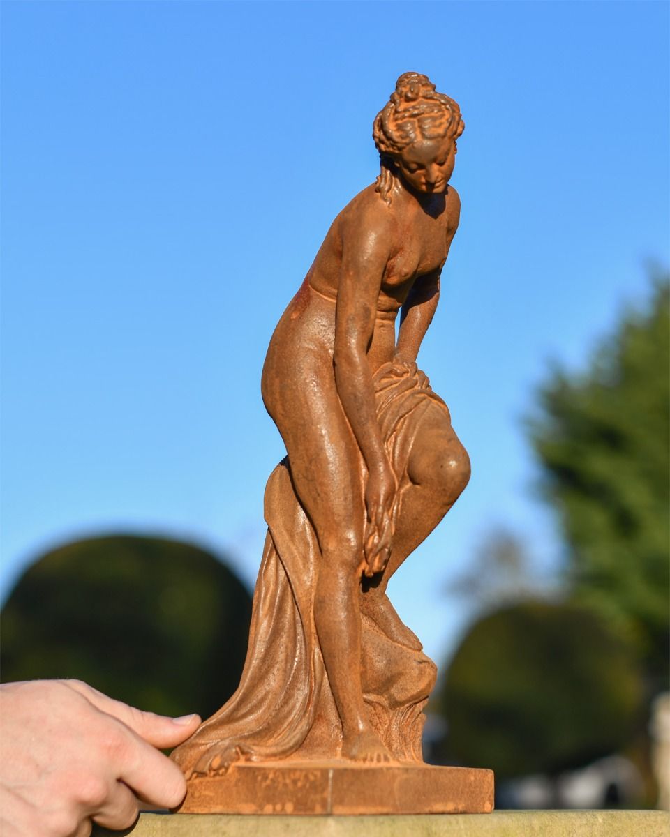 Rustic Cast Iron Woman on Rock Sculpture Rustic Cast Iron Woman on Rock Sculpture