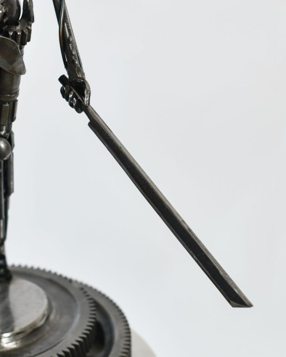 Close up of Bespoke Woman Warrior Artist Sculpture sword