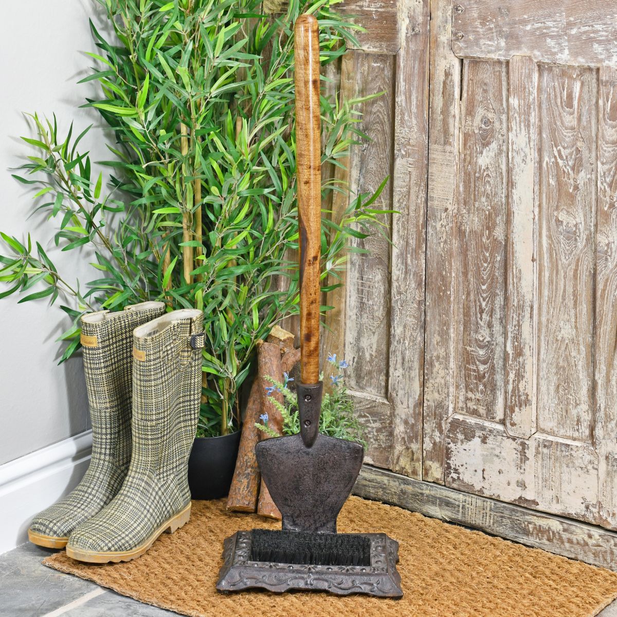 Rustic Garden spade boot brush and scraper by door Rustic Garden spade boot brush and scraper by door