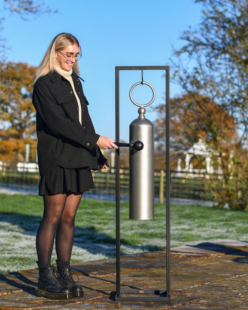 Scale Shot of ZHEN Tubular Silver Powder Coated Gong on Stand