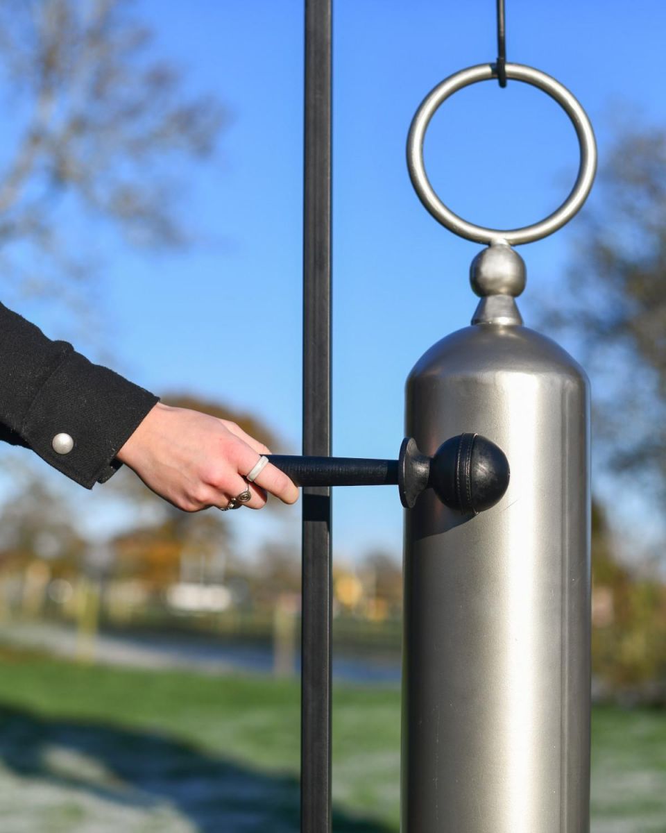 Close-Up of ZHEN Tubular Silver Powder Coated Gong on Stand