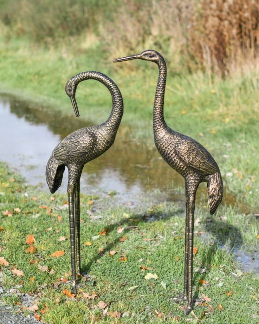 Full view of both crane sculptures Full view of both crane sculptures