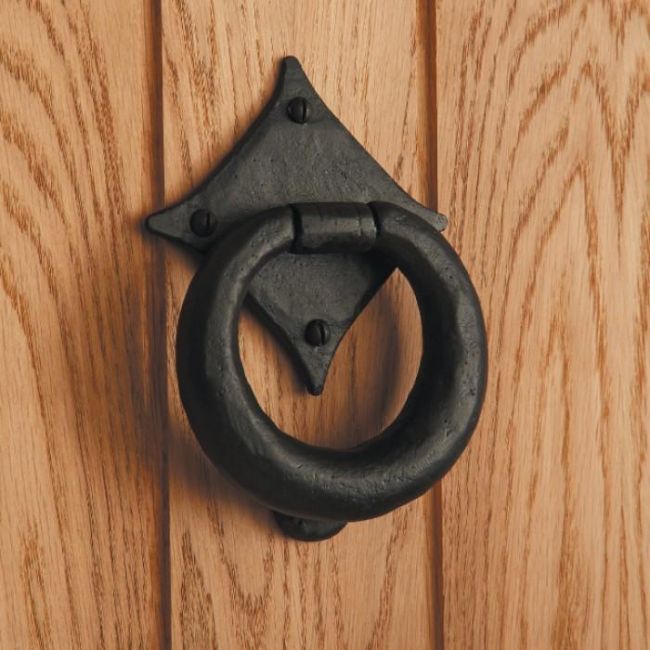 "Braxted Park" Large Natural Iron Door Knocker in Situ on a Wooden Door "Braxted Park" Large Natural Iron Door Knocker in Situ on a Wooden Door