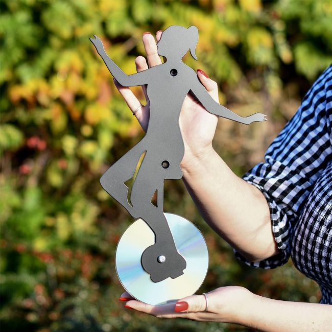 Close Up Of CD Girl on Unicycle Being Held