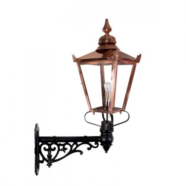Copper Victorian lantern on an Ornate Wall Bracket Copper Victorian lantern on an Ornate Wall Bracket