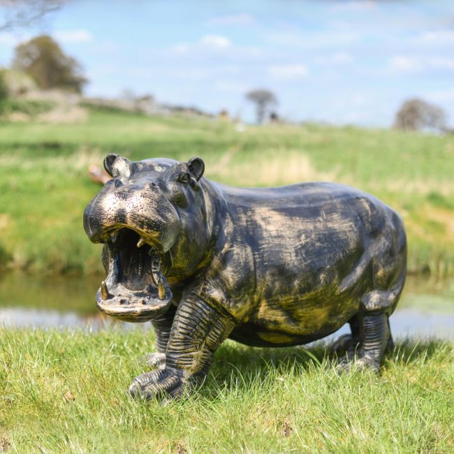 Antique Bronze Hippo Sculpture in situ Outdoors Antique Bronze Hippo Sculpture in situ Outdoors