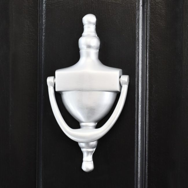 Silver Finish Urn Style Door Knocker on a Black Door Silver Finish Urn Style Door Knocker on a Black Door