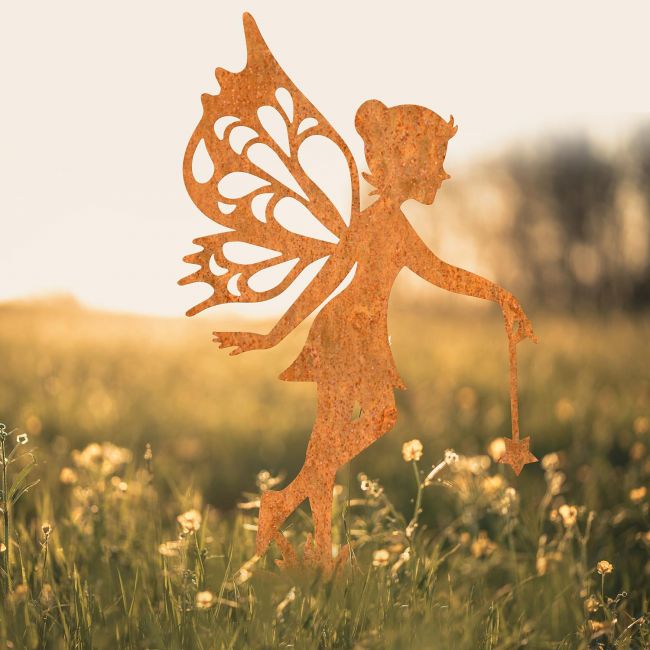 Fairy With Wand Silhouette on Display in a Field