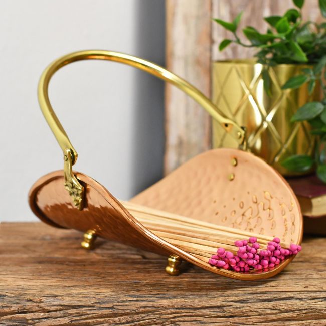 Genuine Copper & Brass Match stick holder on wood table Genuine Copper & Brass Match stick holder on wood table