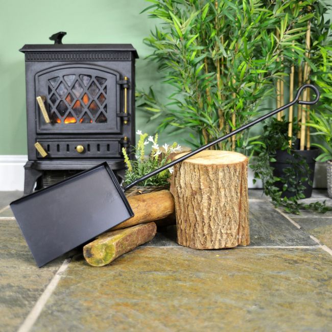 Extra Long Spade Tool Next to the Fire Place Extra Long Spade Tool Next to the Fire Place
