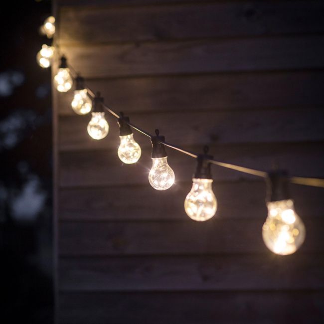 Hanging Bulb Lights in Use at Night Hanging Bulb Lights in Use at Night