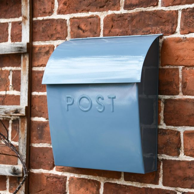 Simplistic mail box mounted on wall Simplistic mail box mounted on wall