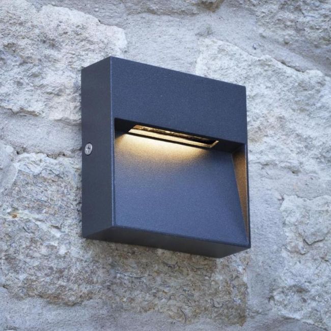 Contemporary Square "Eyelid" Light in Situ on Stone Wall Contemporary Square "Eyelid" Light in Situ on Stone Wall