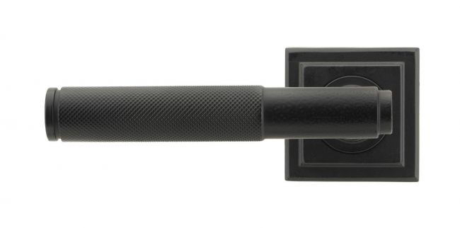 Matte Black Textured Lever Door Handle on Square Rose Front Matte Black Textured Lever Door Handle on Square Rose Front