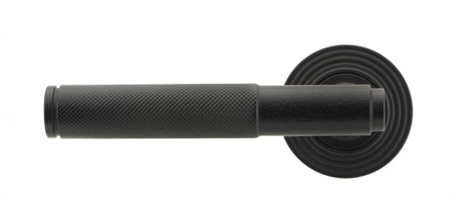 Matte Black Textured Unsprung Lever Door Handle on Beehive Rose Front Matte Black Textured Unsprung Lever Door Handle on Beehive Rose Front
