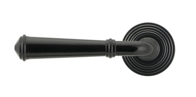 Midnight Black Unsprung Lever Door Handle on Beehive Rose Front Midnight Black Unsprung Lever Door Handle on Beehive Rose Front