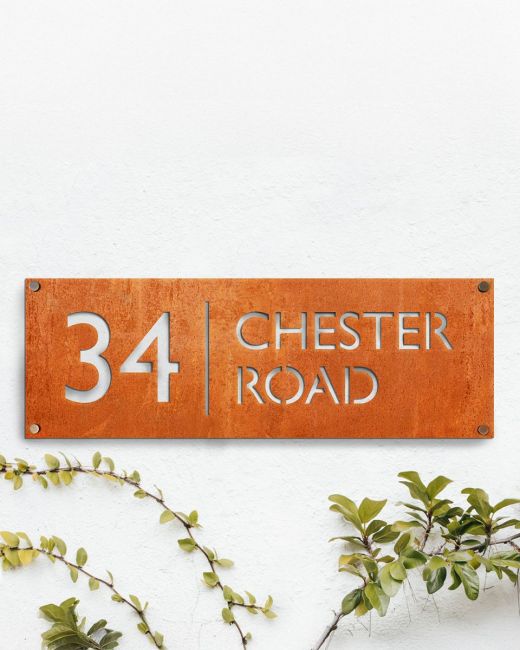 Corten Steel House Number Sign in situ on a White House Wall Corten Steel House Number Sign in situ on a White House Wall