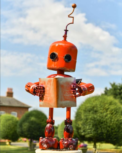 Orange Recycled Metal Robot Sculpture Orange Recycled Metal Robot Sculpture