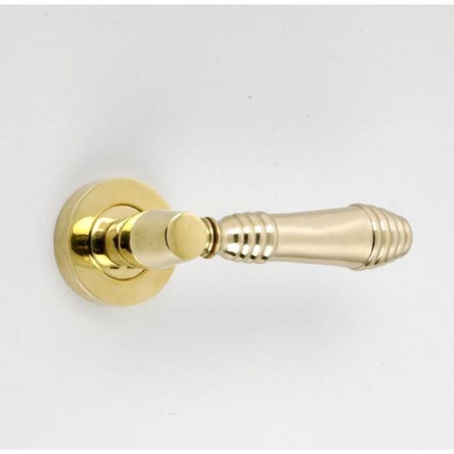 “Beehive” design contemporary lever handle - Polished Brass