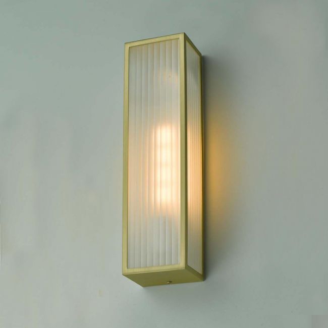 Polished Brass Reeded Glass Wall Light in Situ on a GReen Wall Polished Brass Reeded Glass Wall Light in Situ on a GReen Wall
