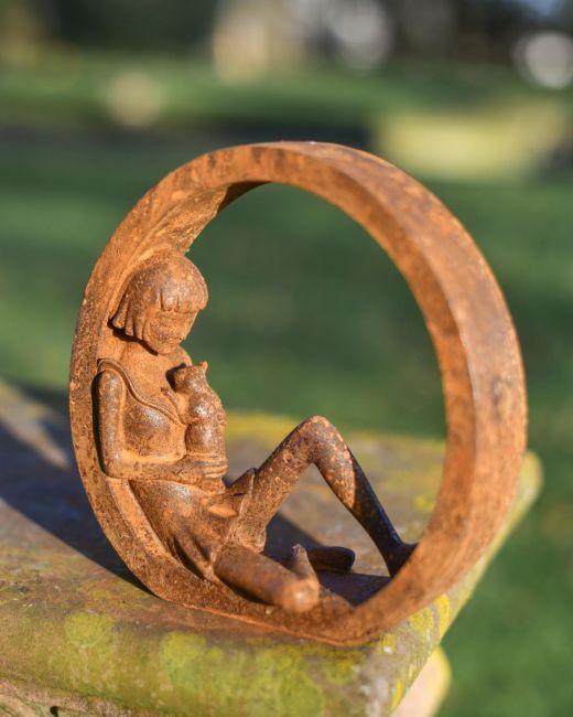 Rustic Cast Iron "Enclosed Care" Garden Sculpture
