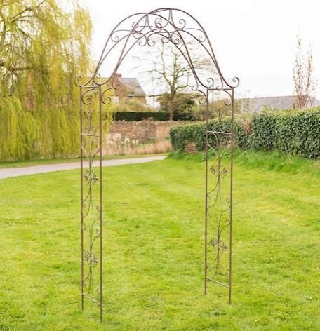 Rustic Fleur De Lys Rose Arch in Situ in the Garden Rustic Fleur De Lys Rose Arch in Situ in the Garden