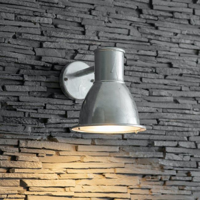 Simplistic Modern Galvanised Steel Wall Light in Situ on a Stone Wall Simplistic Modern Galvanised Steel Wall Light in Situ on a Stone Wall