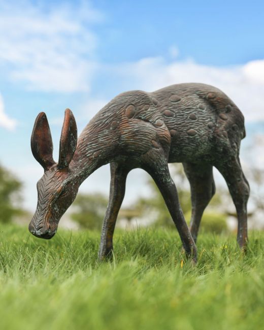 Small Verdigris Doe Grazing full view