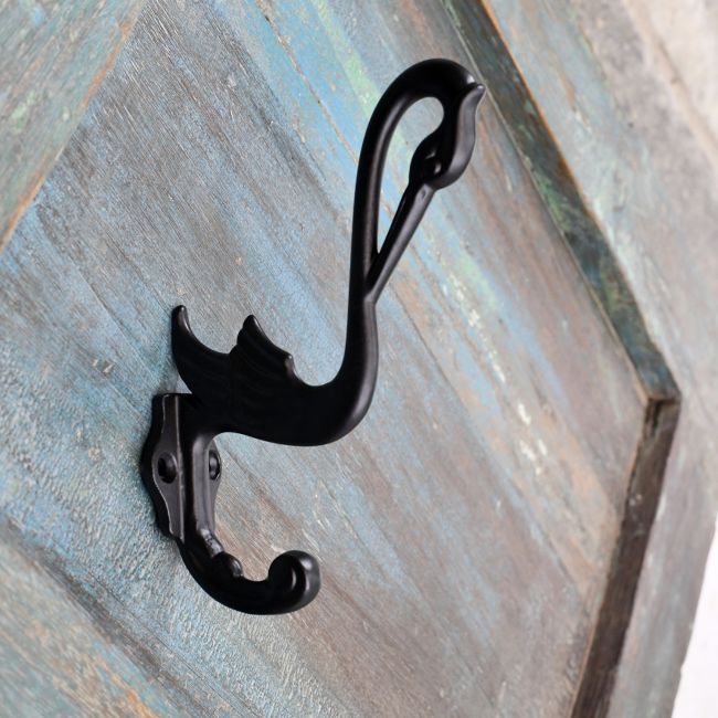 Black Swan Coat Hook on a Shabby Chic Painted Surface Black Swan Coat Hook on a Shabby Chic Painted Surface