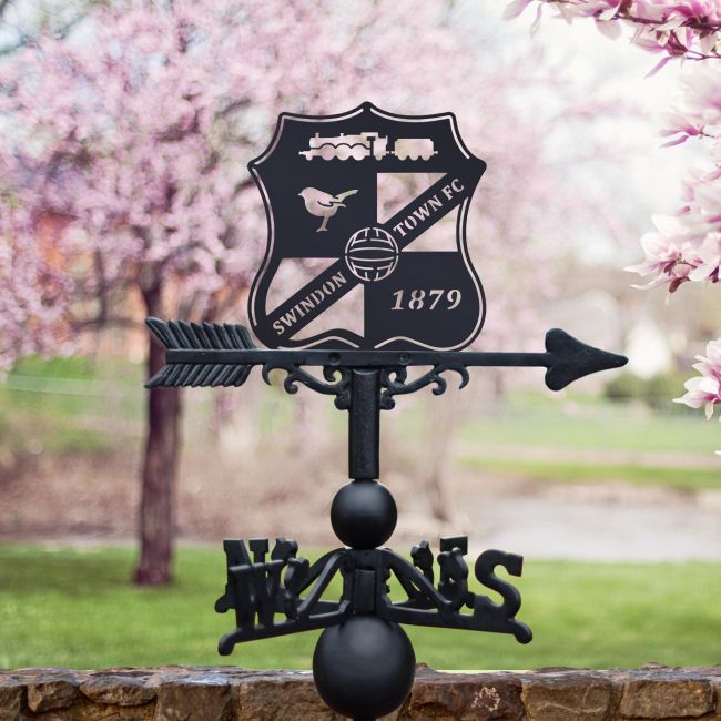"Swindon Shield" Weathervane in Use by Blossom Trees "Swindon Shield" Weathervane in Use by Blossom Trees