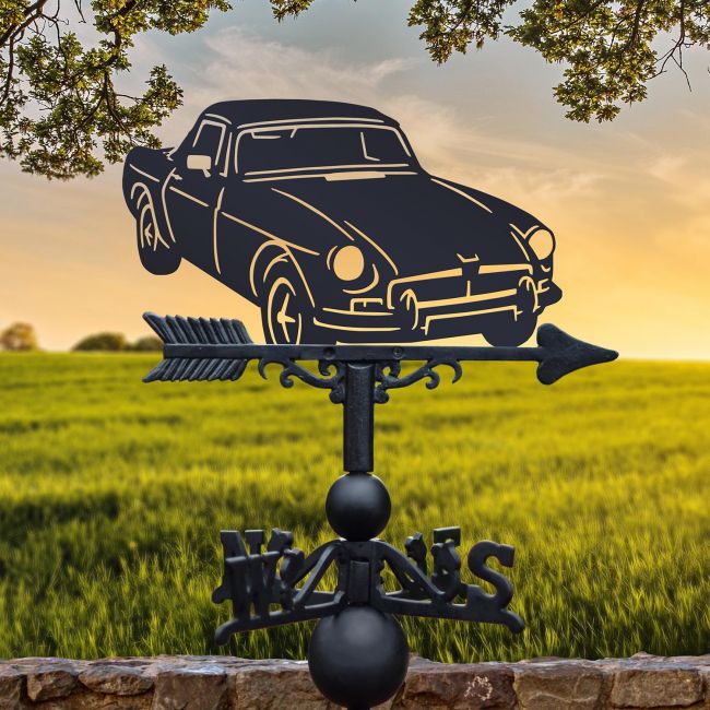 Black MGB Roadster Weathervane on field background Black MGB Roadster Weathervane on field background