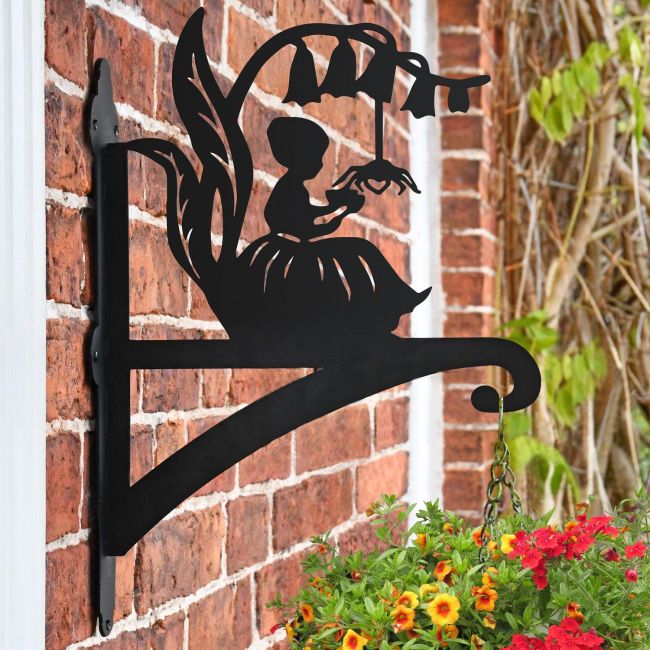 Little Miss Muffet Bracket on Garden Shovel Hanging Basket Bracket in Situ on a Brick Wall