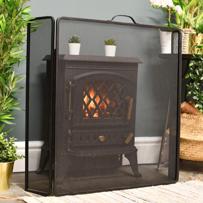 Traditional Three Fold Winged Fire Guard in Front of log burner Traditional Three Fold Winged Fire Guard in Front of log burner
