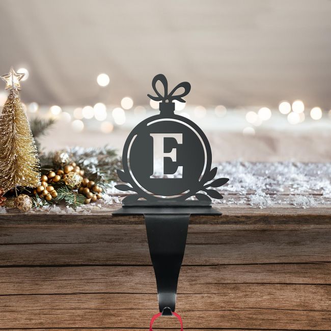 Letter E Stocking Holder in Situ on a Mantel Piece Letter E Stocking Holder in Situ on a Mantel Piece