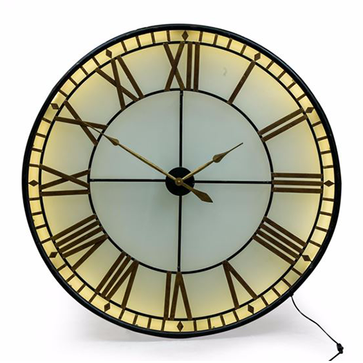 Vintage Back Lit Wall Clock in a Black and Gold Finish Vintage Back Lit Wall Clock in a Black and Gold Finish