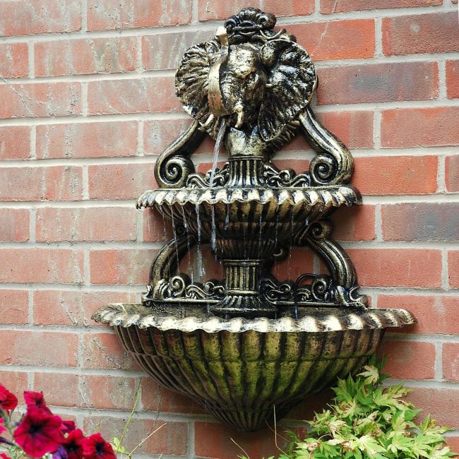Wall Mounted Golden Elephant Fountain in Situ