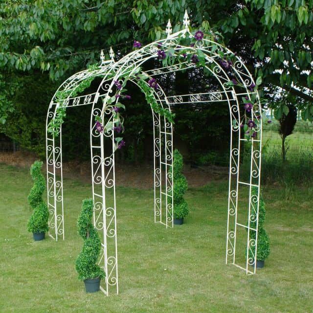 Cream tubular iron garden walkway rose arch Cream tubular iron garden walkway rose arch