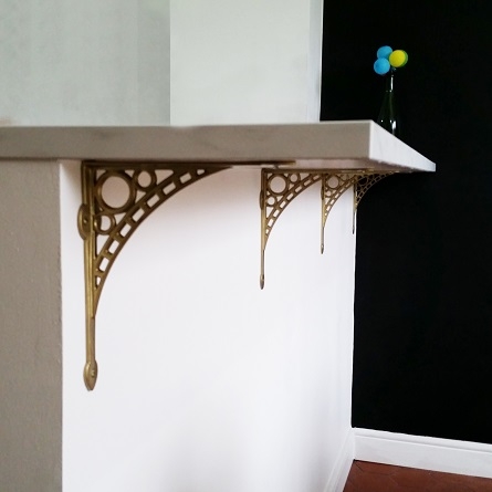 Custom gold shelf brackets