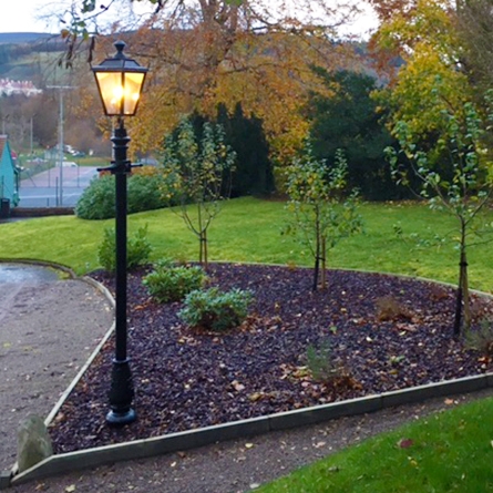 Victorian lamp post lit up