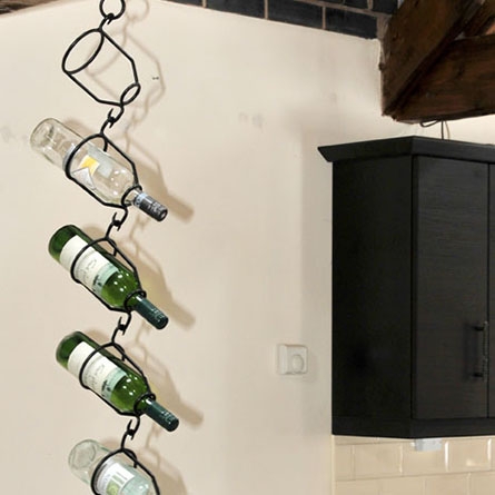 Hanging wine bottle holder